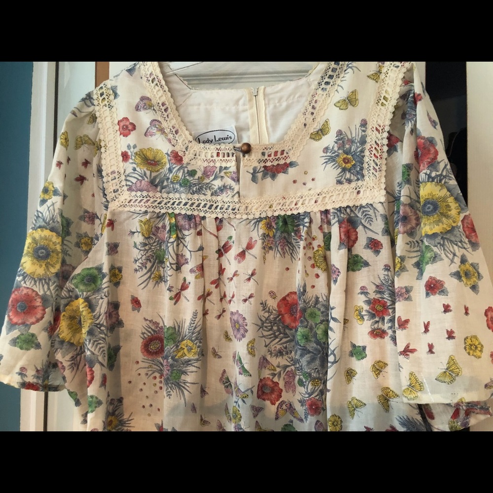 Dragonflies and Butterflies adorn this printed full length dress.58”L.